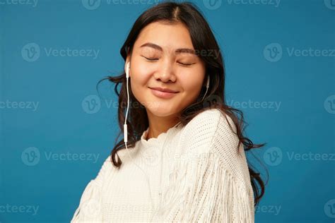Horizontal Photo Of Young Lovely Long Haired Asian Lady With Natural