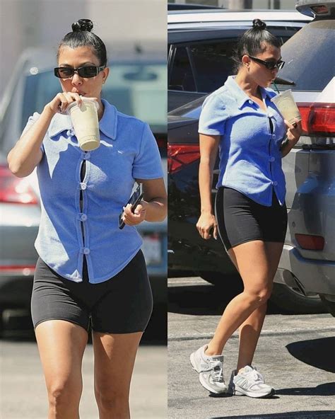 Kourtney Kardashian Shows Off Her Legs In Biker Shorts And A T Shirt As She Walks With Her Ex