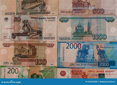 Russian Currency Banknotes Of Various Denominations Are Laid Out On The Table In Ascending Order