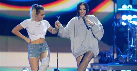 Miley Cyrus Says Singing With Her Sister Was “fun” Until She Spit “in