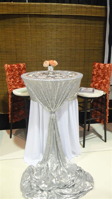 The coffee table decor formula: fun tall cocktail with custom silver sequin linen ...