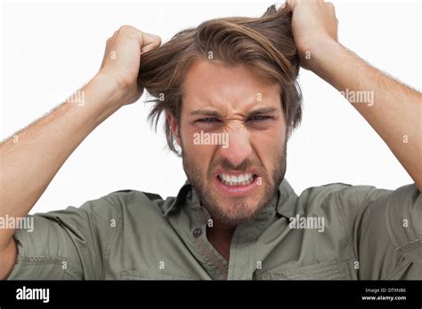 Furious Man Pulling His Hair Stock Photo Alamy