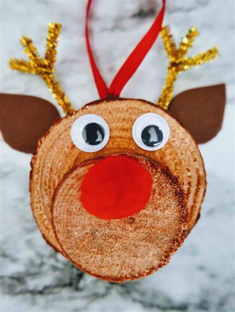 Diy Reindeer Ornaments With Wood Slices Marcie In Mommyland