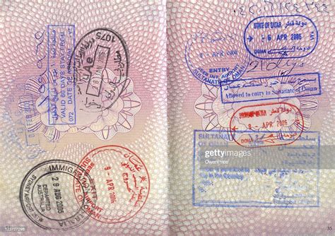 An Opened Passport With Entry Stamps On Both Pages High Res Stock Photo