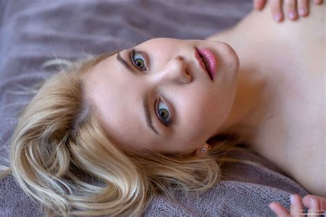 Blonde Model Face Women In Bed Green Eyes Lying On Back Juicy