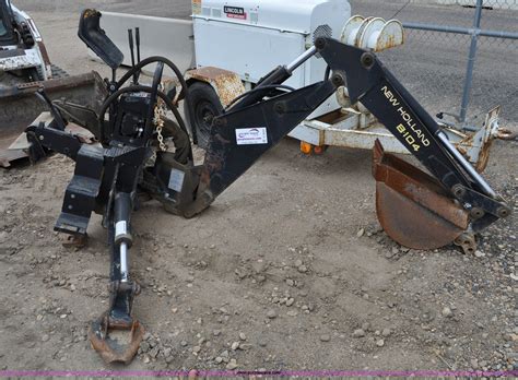 New Holland B 104 Backhoe Skid Steer Attachment In Brighton Co Item