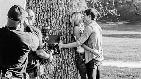 pedro pascal and heidi klum behind the scenes of the music video for the single fire meet