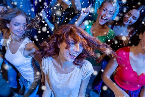 Smiling Friends Dancing In Club — Stock Photo © Sydaproductions 86746160