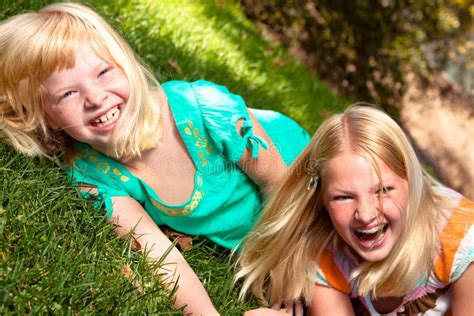 Two Sisters Laughing And Having Fun Stock Image Image Of Outdoors