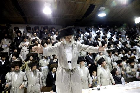 An Ultra Orthodox Jewish Man Dances On The Table During The
