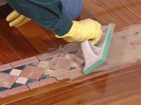 Border tiles are the mosaic tiles that are used to accentuate bathroom décor. How to Install a Mixed-Media Floor | how-tos | DIY