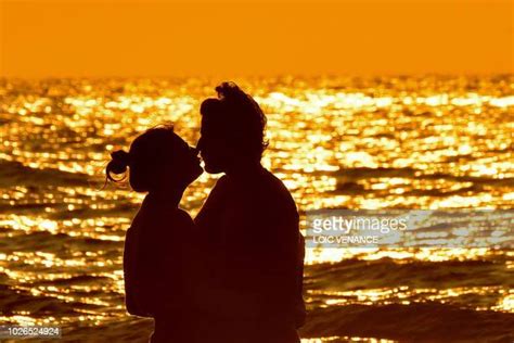 Sunset Kiss Photos And Premium High Res Pictures Getty Images