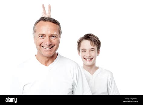 Happy Playful Father And Son Posing To The Camera Stock Photo Alamy