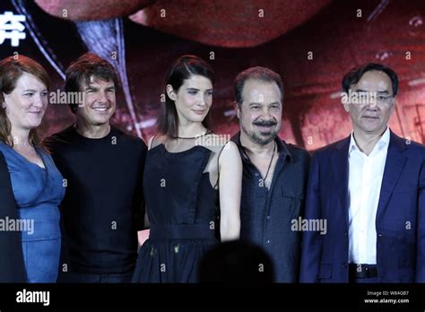 From Second Left To Right American Actor Tom Cruise Canadian Actress Cobie Smulders And