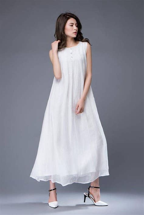 The Prom Dress Is Made Of White Chiffon Outer And White Linen Inner