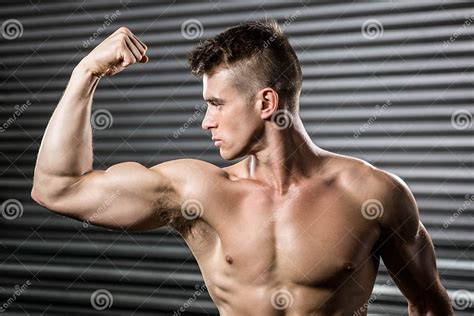 Shirtless Man Flexing Biceps Stock Image Image Of Exercise Flexing