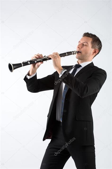 Young Man Playing The Clarinet Stock Photo By ©runner858 97276164