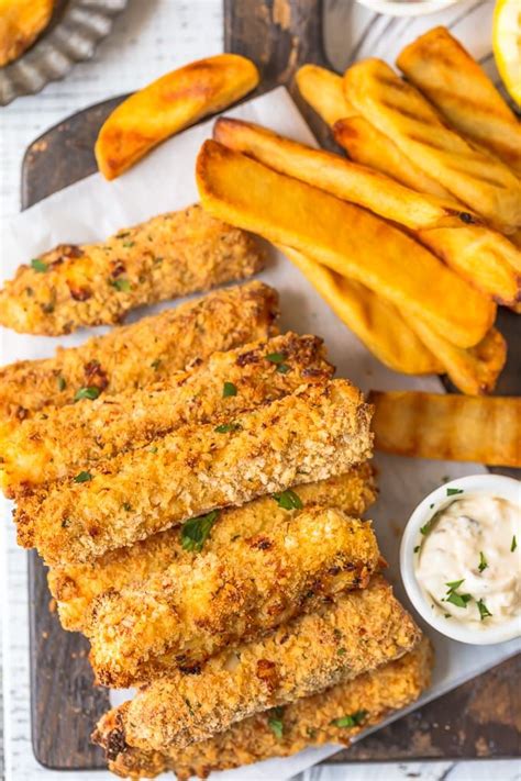 Fish Sticks And Thick Fries On A Wooden Platter Oven Baked Fish