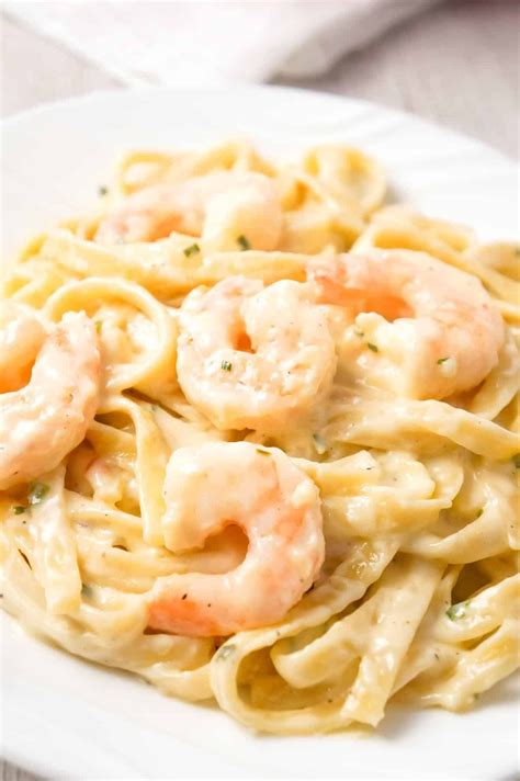 fettuccine alfredo with shrimp is a delicious seafood pasta recipe with a creamy garlic parmesan