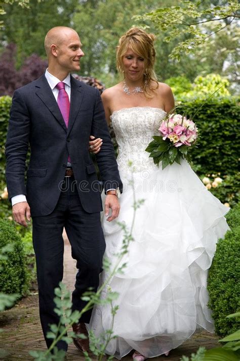 Gifts for young couples getting married. Getting married. Beautiful young couple walking together ...