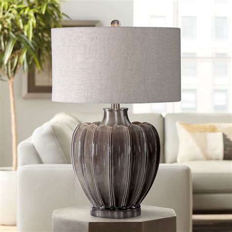 Enliven your space with added style the addition of this stunning grey ceramic table lamp will enhance any room it is placed. Uttermost Adler Smoky Gray Glaze Ceramic Table Lamp ...