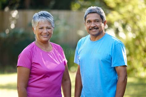 We Keep Each Other Motivated Portrait Of A Mature Husband And Wife Exercising Together Stock