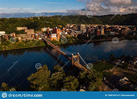 Aerial Of Historic Wheeling Suspension Bridge Downtown Buildings