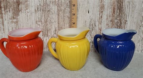 Vintage Orange Yellow Blue Ribbed Milk Glass Creamers Syrup Pitcher