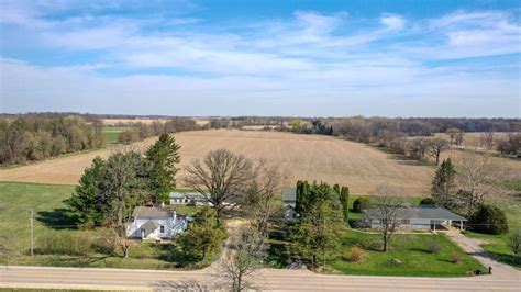 Two Homes And Outbuildings On Small Acreage For Sale Near Poplar Grove Whitetail Properties