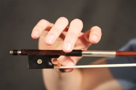 Properly holding the bow is one of the most important parts of playing the fiddle. Learn to Develop a More Natural-feeling Bow Hold - Strings ...