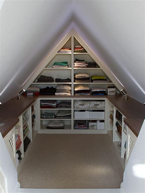 An Attic Closet With Open Shelving And Shelves