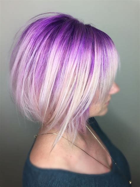 Honey blonde hair with blue and purple highlights looks divine! Purple Smudged Blonde hair .. Icy blonde short bob haircut ...