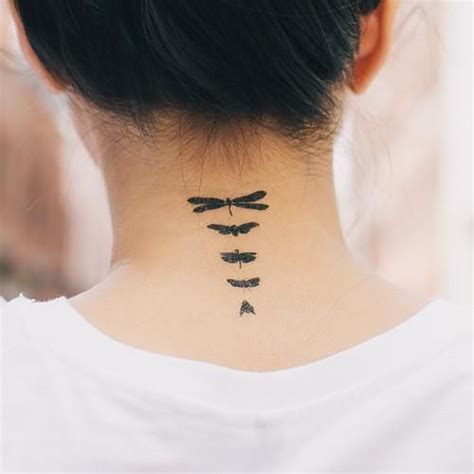 Often very feminine tattoo designs. Cute dragonfly tattoo - Design of TattoosDesign of Tattoos