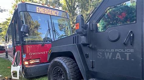 1 dead after bus hijacked at gunpoint in downtown Atlanta; suspect in