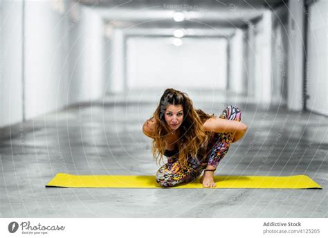 Slim Woman Practicing Advanced Yoga Asana A Royalty Free Stock Photo