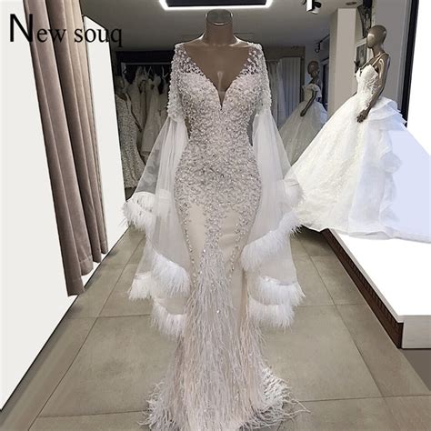 Here's the long and short of it: White Evening Dresses Feather Long Sleeves Mermaid Wedding ...