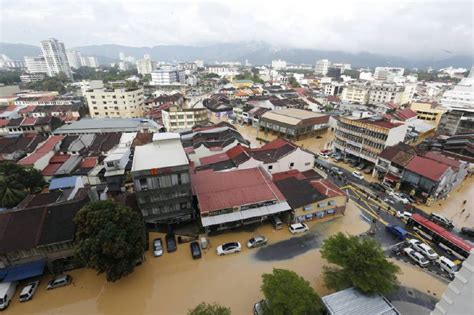Fifteen malaysian immigration officers are fired, after being accused of sabotaging computer passport systems to let in certain travellers undetected. Penang flooding almost catastrophic; landslides widespread ...