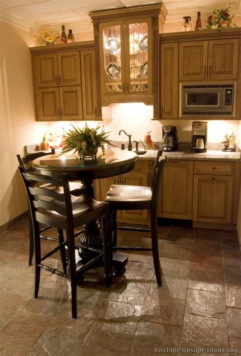 Natural wood tones aren't the only option for your kitchen cabinets. Pictures of Kitchens - Traditional - Medium Wood Cabinets ...