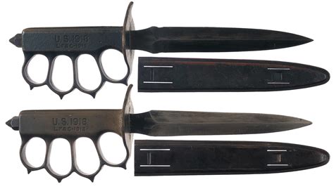 Two Model 1918 Trench Knives With Scabbards Rock Island Auction