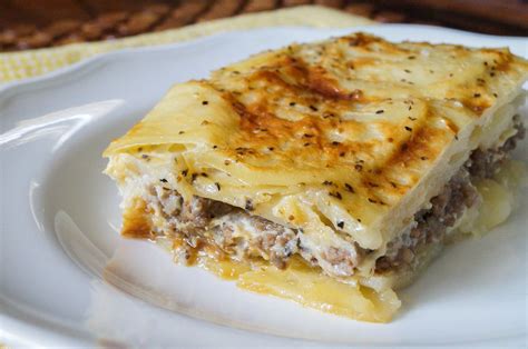Chunks of tender beef are cooked with shallots in a rich aromatic tomato sauce. Musaka (Serbian Potato Moussaka) | Serbian recipes ...
