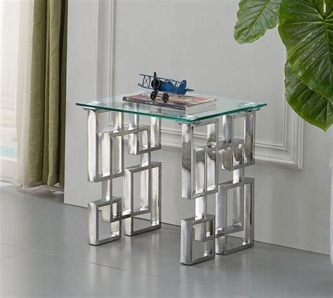 Two broad cubby shelves provide ample space for books, tablets and remotes. Alexis End Table (Chrome) by Meridian Furniture ...