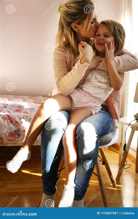 Mother Holding Her Daughter In Lap Stock Image Image Of Daughter Mother 119567997