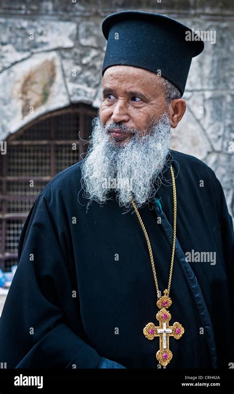 Ethiopian Orthodox Priest Await The Start Of The Holy Fire Ceremony At