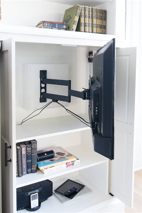 Corner tv cabinets can be made from real timber, pushed board with wood finish, or in advanced glass and steel types. Friday Feels - Hidden TV Cabinet Built-ins - The Lilypad ...