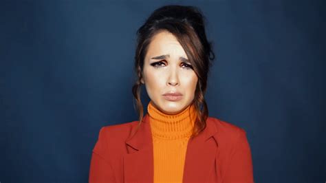 close up portrait of glamorous brunette girl starting to cry stylish woman is crying brunette
