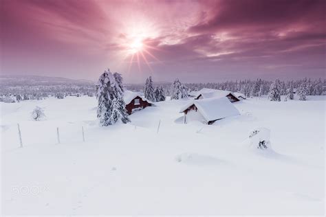 Sunrise Over Snowbound Norwegian Village