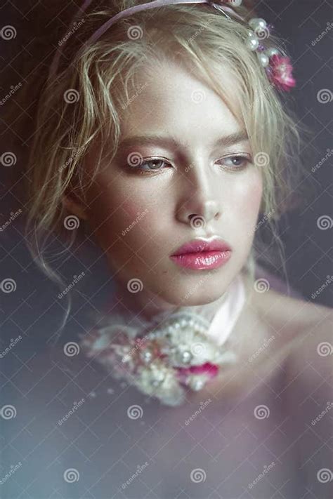 Beautiful Blond Fashion Girl With Flowers On Neck And In Her Hair Wet Nude Makeup Beauty Face