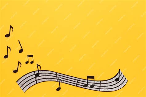 Premium Photo Musical Stave And Notes On Yellow Background