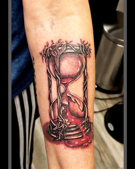 The Meaning Behind Broken Hourglass Tattoos Capturing The Essence Of
