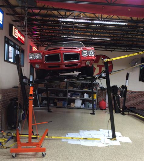 Most car lifts can be mounted on the roof of your garage, so it's easily accessible whenever you're working on your vehicle. Speaking of 2 post, 4 post, hoists in general | For A ...